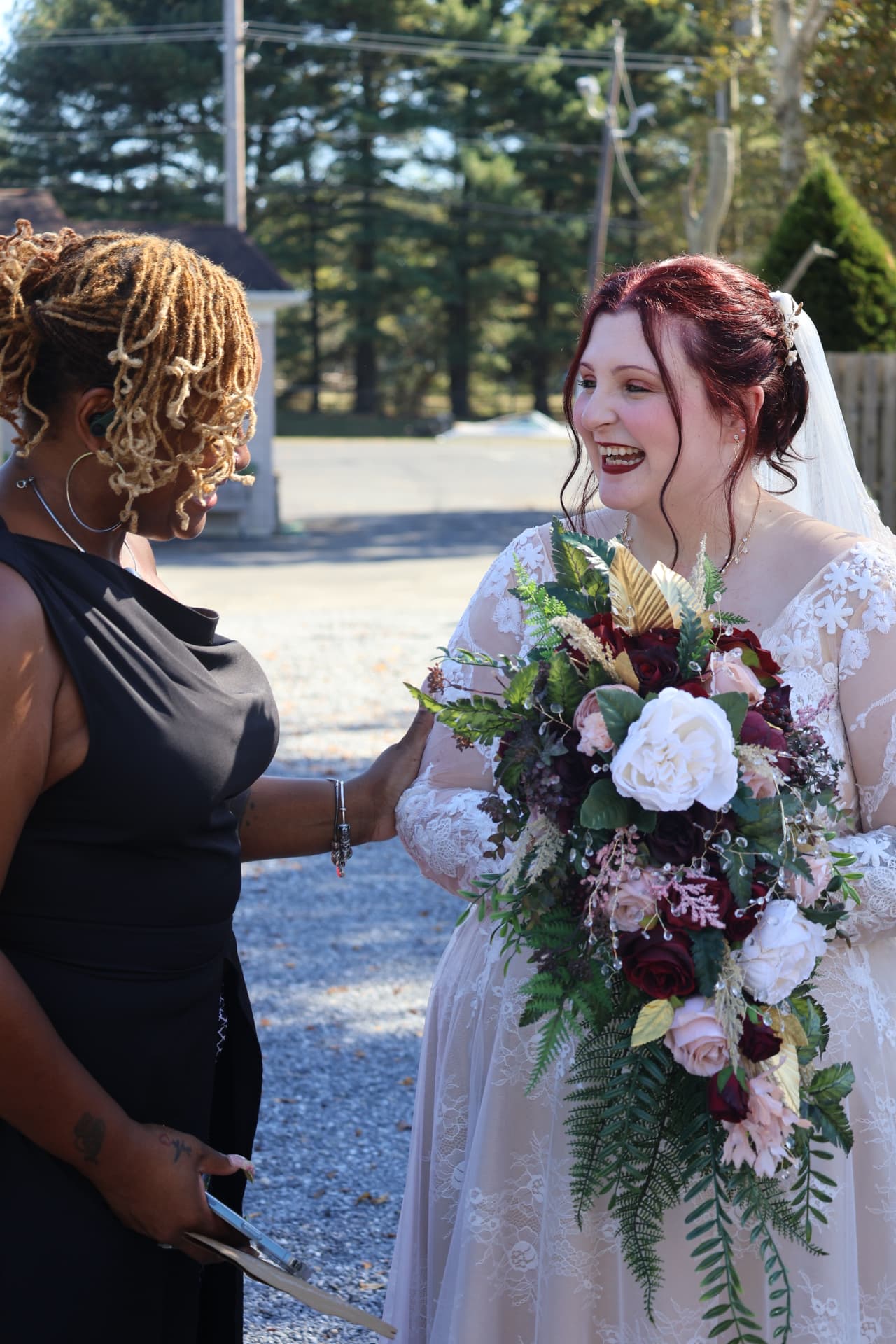 Kesha warmly connecting with a bride after her wedding ceremony