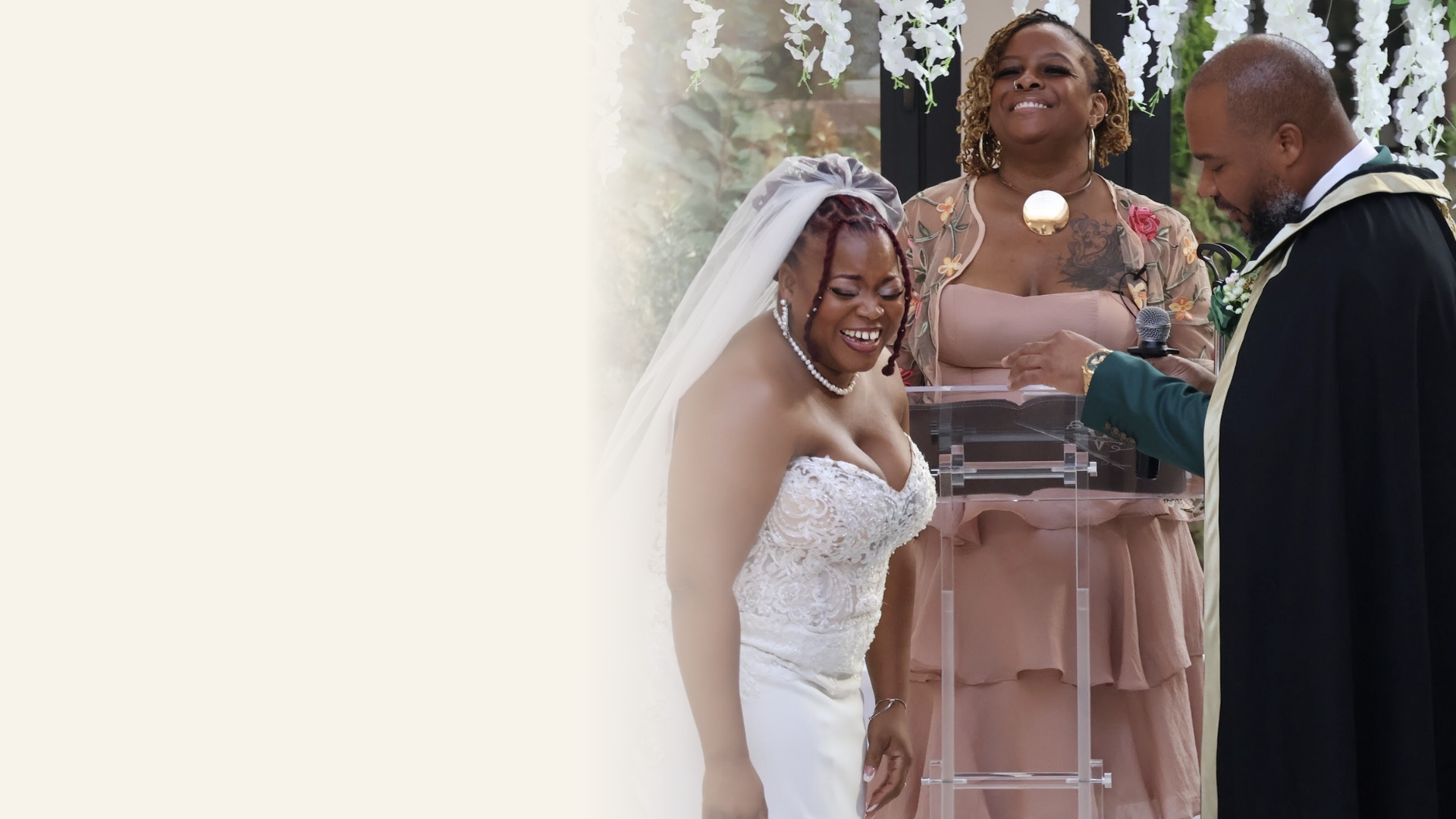 Kesha officiating as a smiling bride and groom stand at the altar